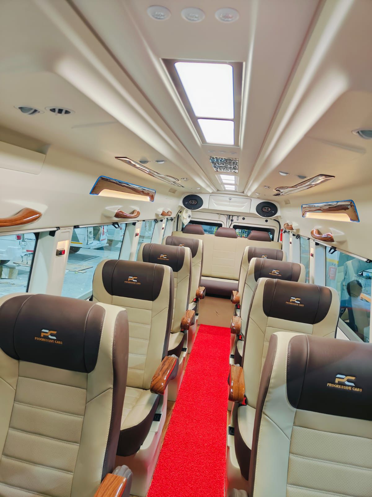 Spacious Tempo Traveller seating arrangement