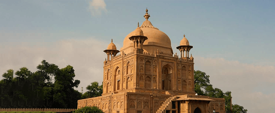 Heritage Anand Bhavan mansion framed by trees