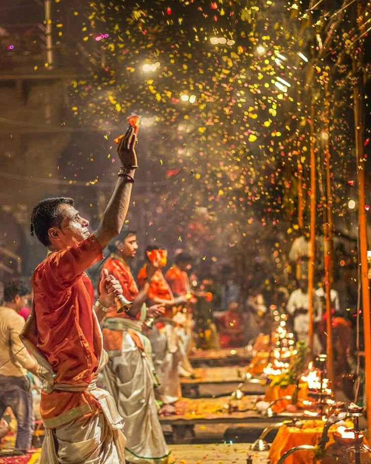 A close-up of the Ganga Aarti ceremony from a boat.